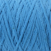close up of blue Okey Dokey brand chenille yarn with labels showing the yarn type and brand name.